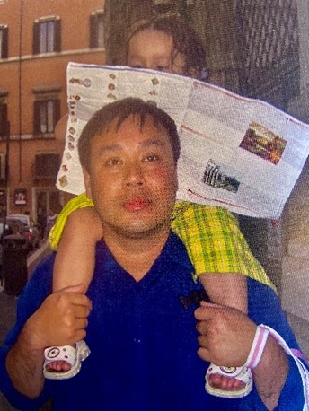 Hong and his child in Rome, Italy